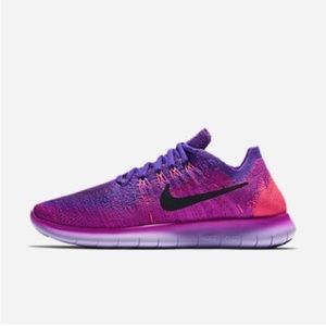 Women’s Nike Free RN Flyknit running shoes. Size 10.5. Pink and purple